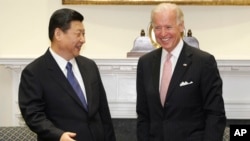 Ông Joe Biden tiếp ông Tập Cận Bình tại Nhà Trắng hồi năm 2012 khi ông còn là phó Tổng thống và ông Tập còn là phó chủ tịch Trung Quốc.