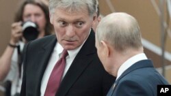 Kremlin sözcüsü Dimitri Peskov ve Rusya Cumhurbaşkanı Vladimir Putin. 